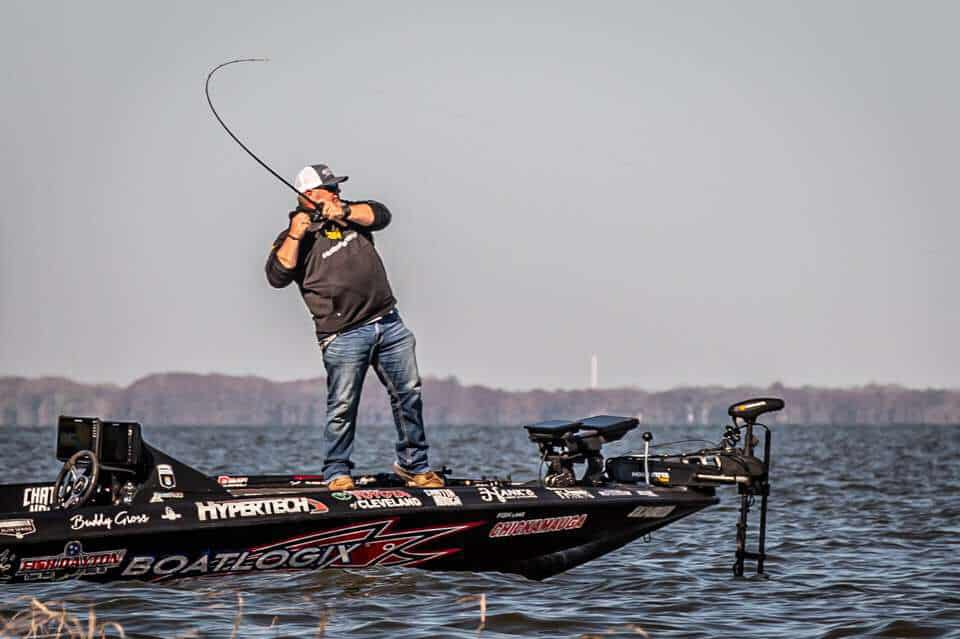 buddy gross reeling in a bass during harris chain bassmaster elite event